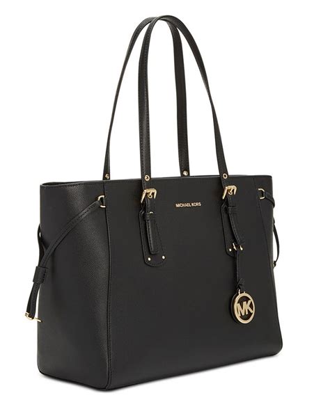 michael kors voyager medium east west multifunction top-zip tote fawn|michael michael kors voyager east west signature tote.